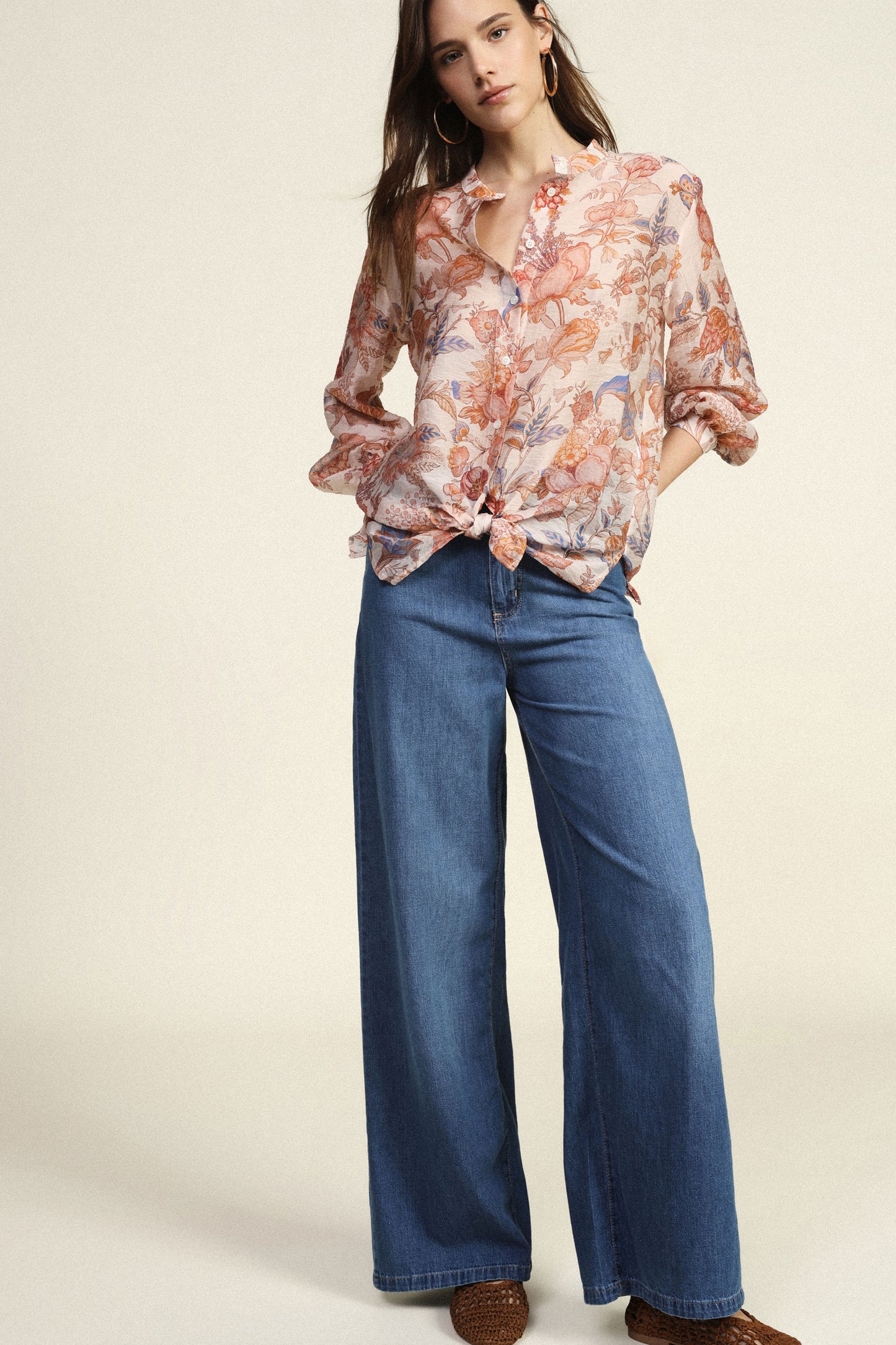 Jeans a gamba larga vita alta con tasche