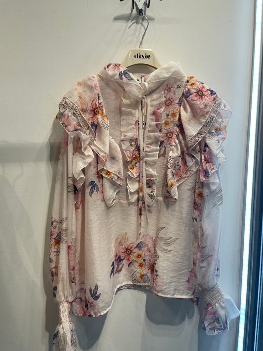 Blusa a fiori con volant manica lunga