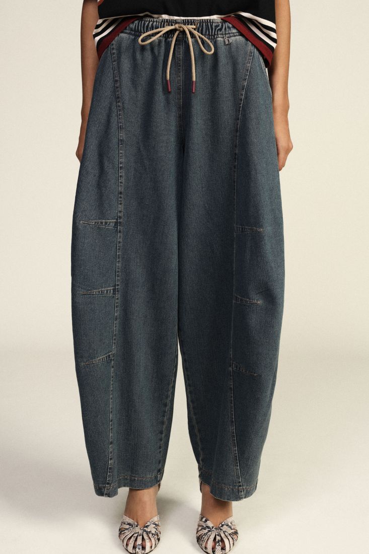 Pantaloni palazzo ampi con coulisse vita alta