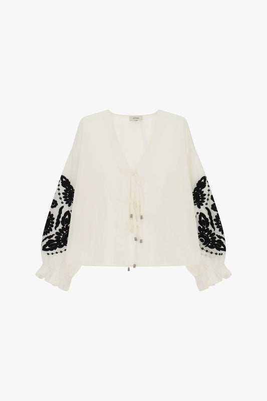 Blusa ampia con ricami floreali e laccetti 100%Cotone