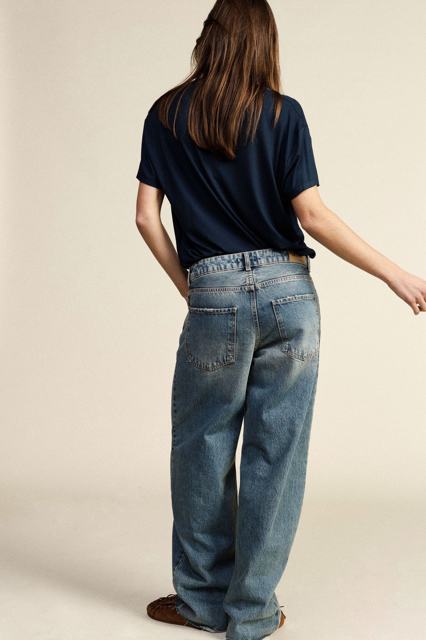 Jeans a gamba ampia vita alta con cinque tasche